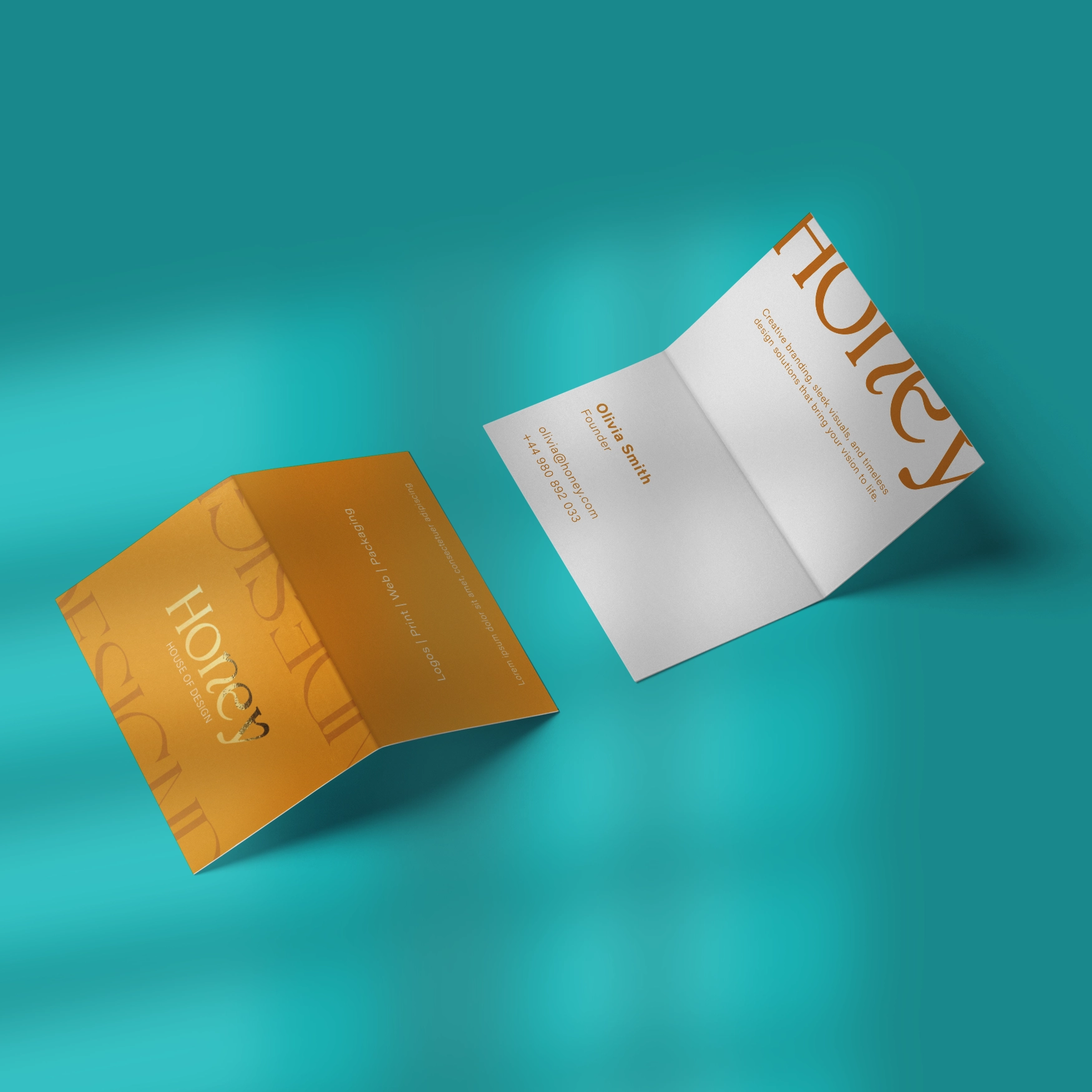 A folded business card mockup displayed on a bright turquoise background. The front of the card is a rich golden orange color with the word “Honey” and design-related text printed in elegant typography. The inside of the card is white with orange text showing a person’s name, “Olivia Smith,” contact details, and part of the “Honey” logo. The card is partially open, showing both the inside and outside design.