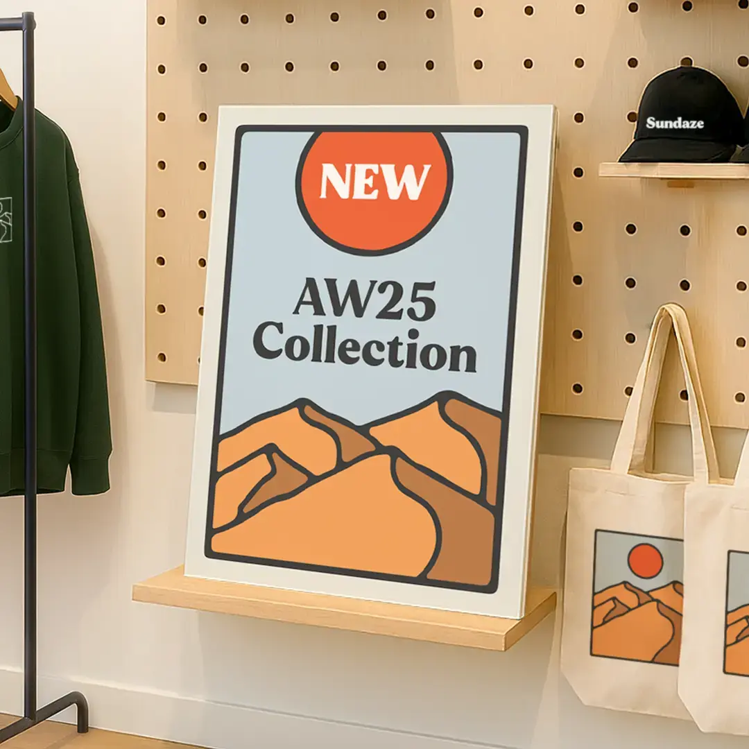 "AW2025" New Collection Display Board on a shop wall