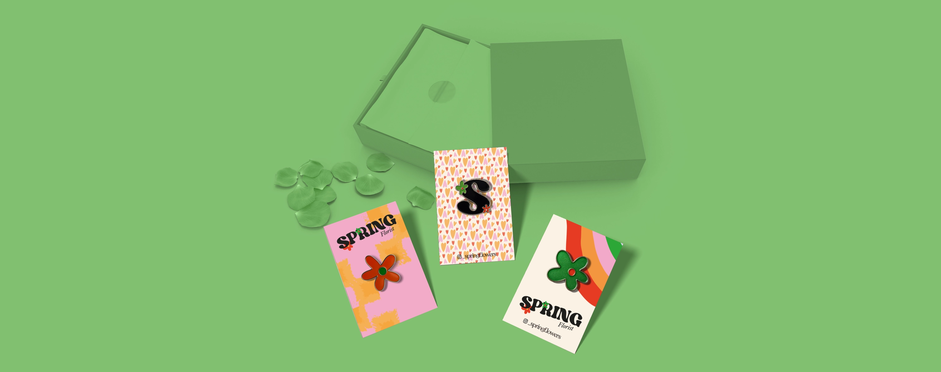 Colourful Pin Backing Cards next to packaging