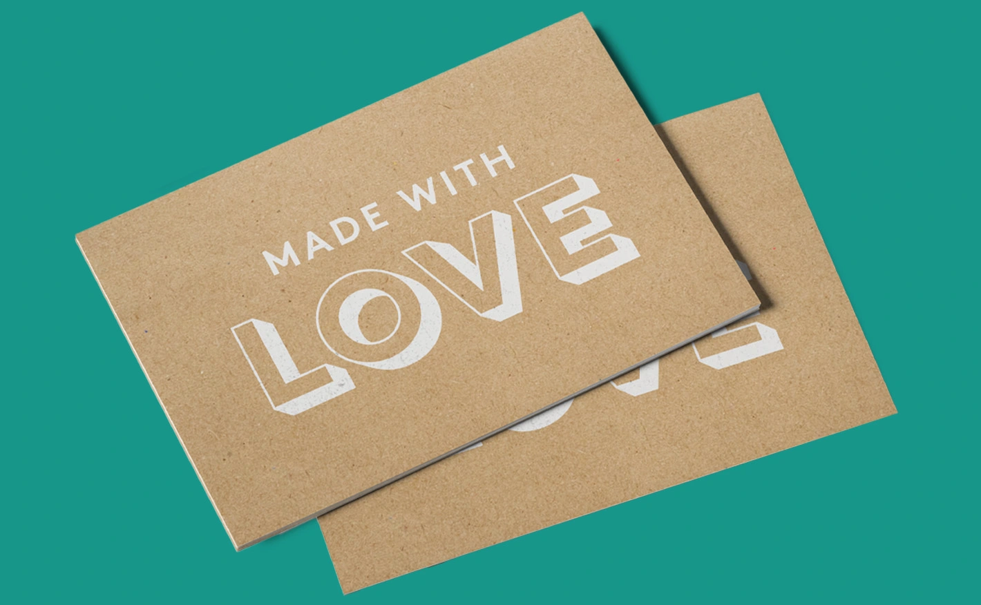 Brown Kraft Postcards on a teal background; the top card reads “MADE WITH LOVE” in bold white ink text