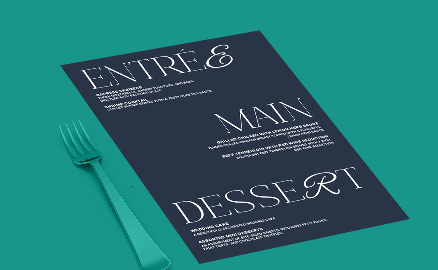 Dark blue Wedding Menu card with white ink text, placed on a teal surface beside a matching fork and knife