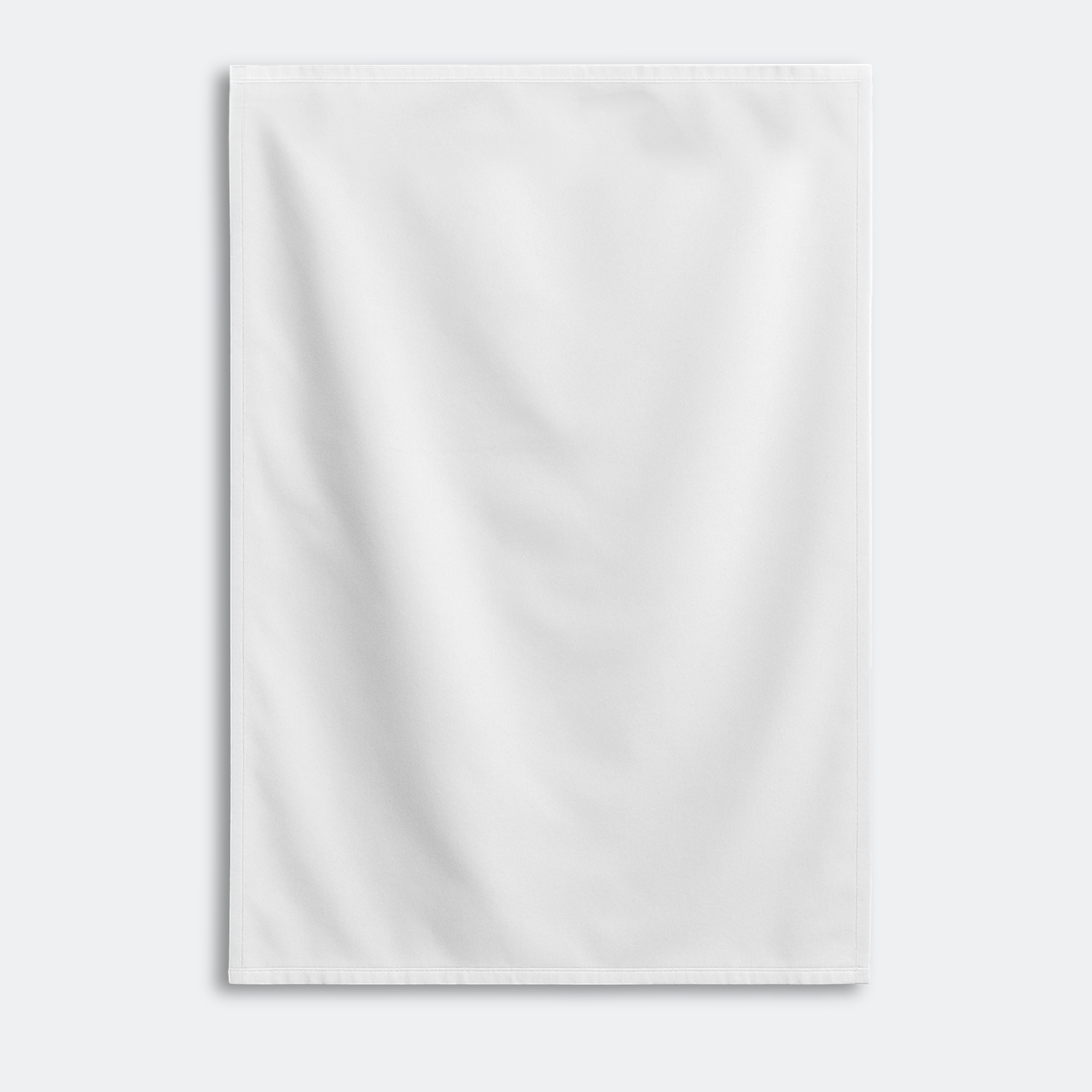 White fabric with stitched edge, laid flat on light grey background.