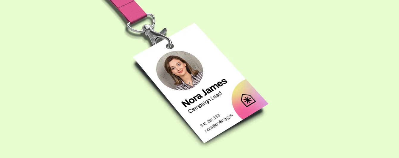A vertical ID card for "Nora James, Campaign Lead," attached to a pink lanyard, featuring her photo, contact details, and the campaign’s house logo on a pink and yellow gradient background