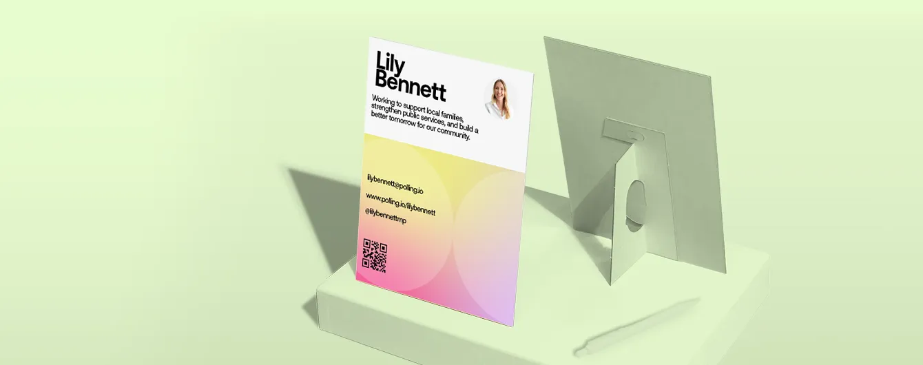 A promotional strut card for political candidate Lily Bennett, featuring her photo, contact details, and a QR code against a yellow and pink gradient background, displayed on a light green podium.