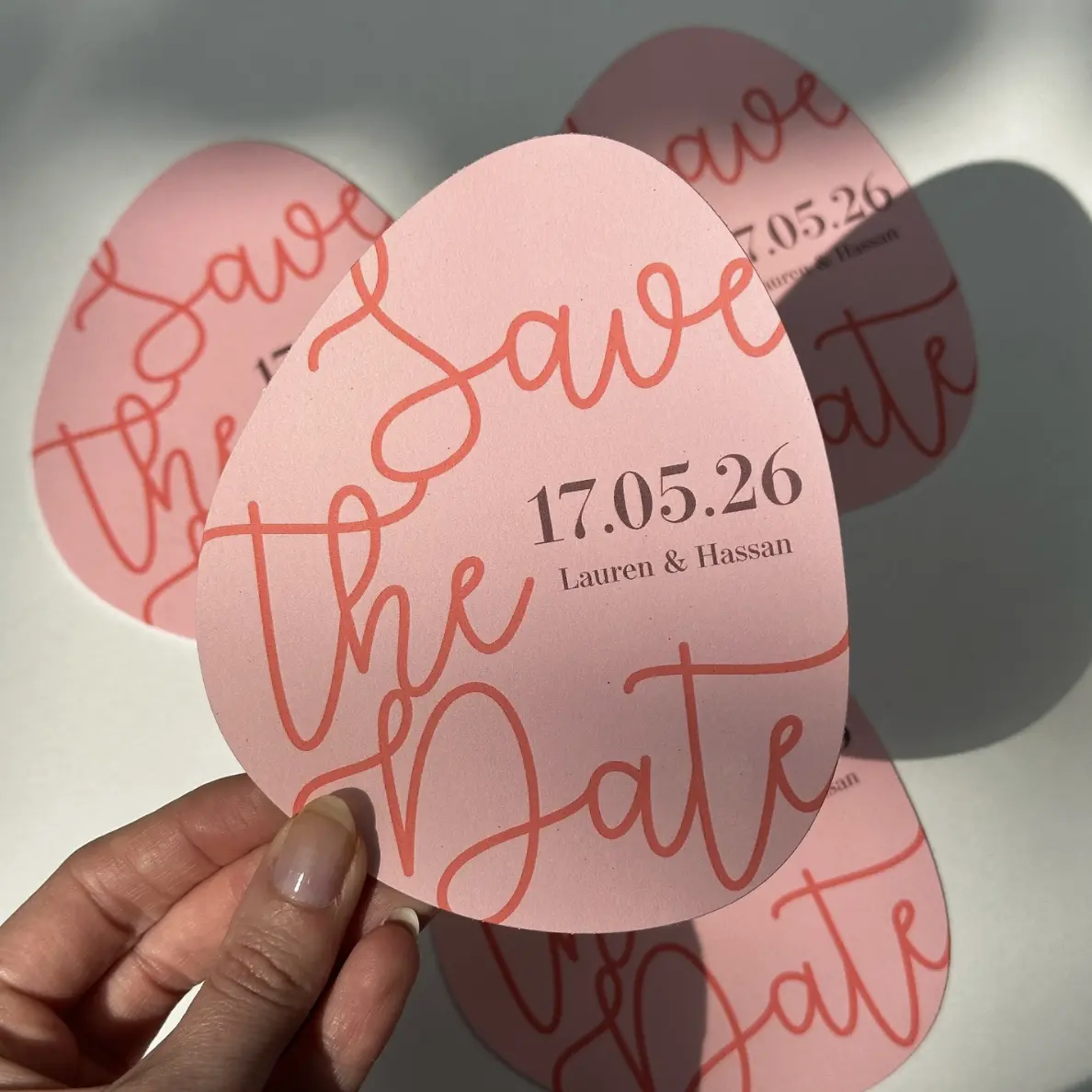 Pink pebble shaped Wedding Save the Date Cards