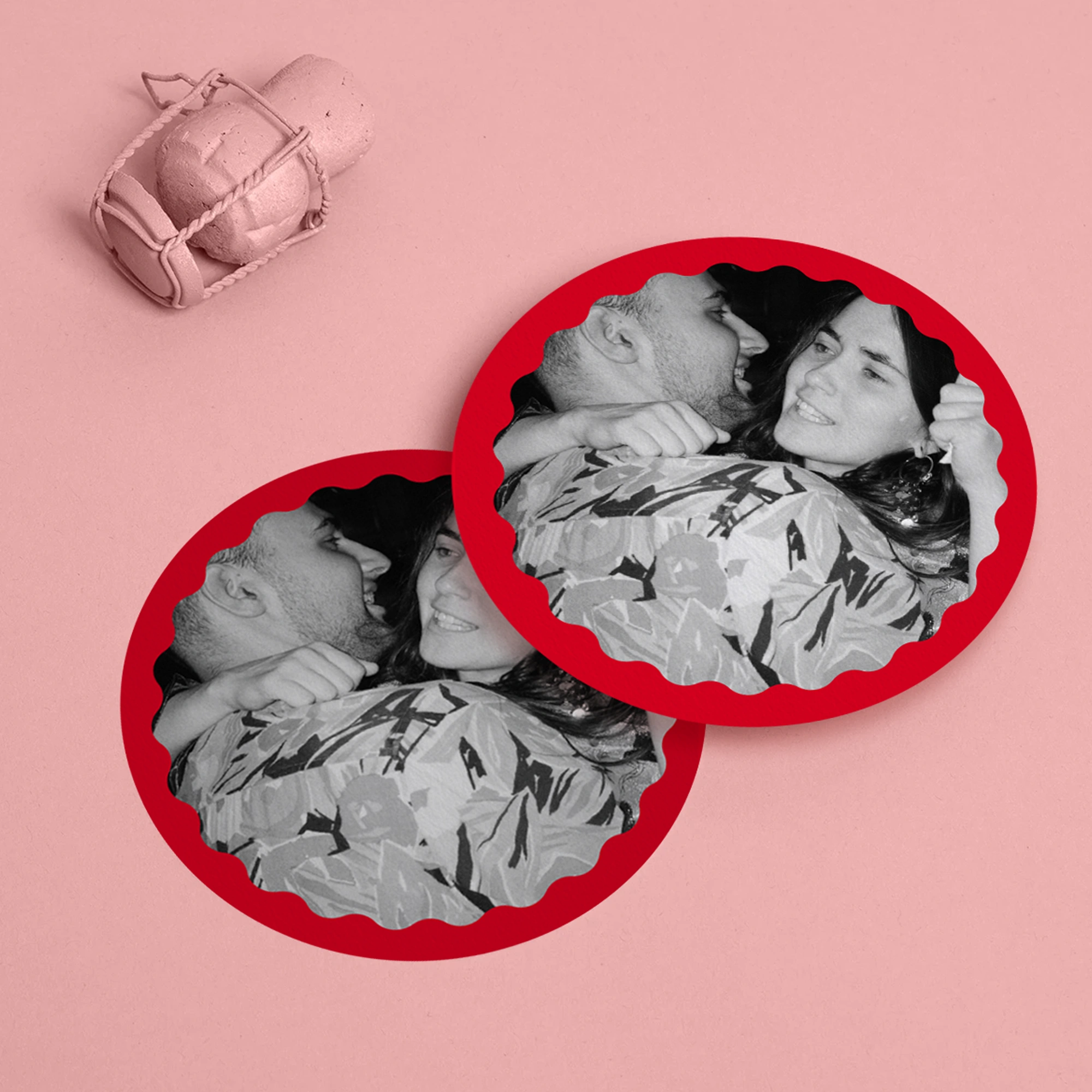 Two circular, red-bordered Wedding Coasters featuring a black-and-white photo of a couple,