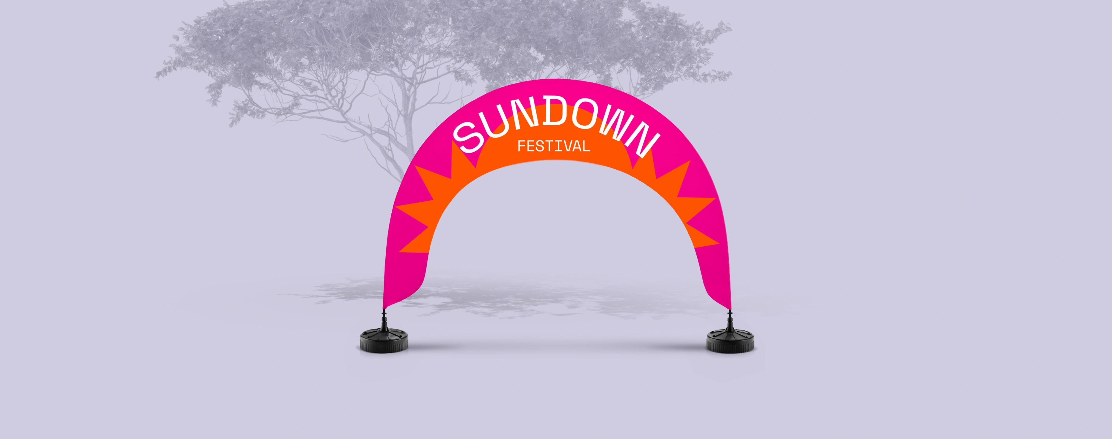 Vibrant arch flag on a soft backdrop for a festival‑themed event.