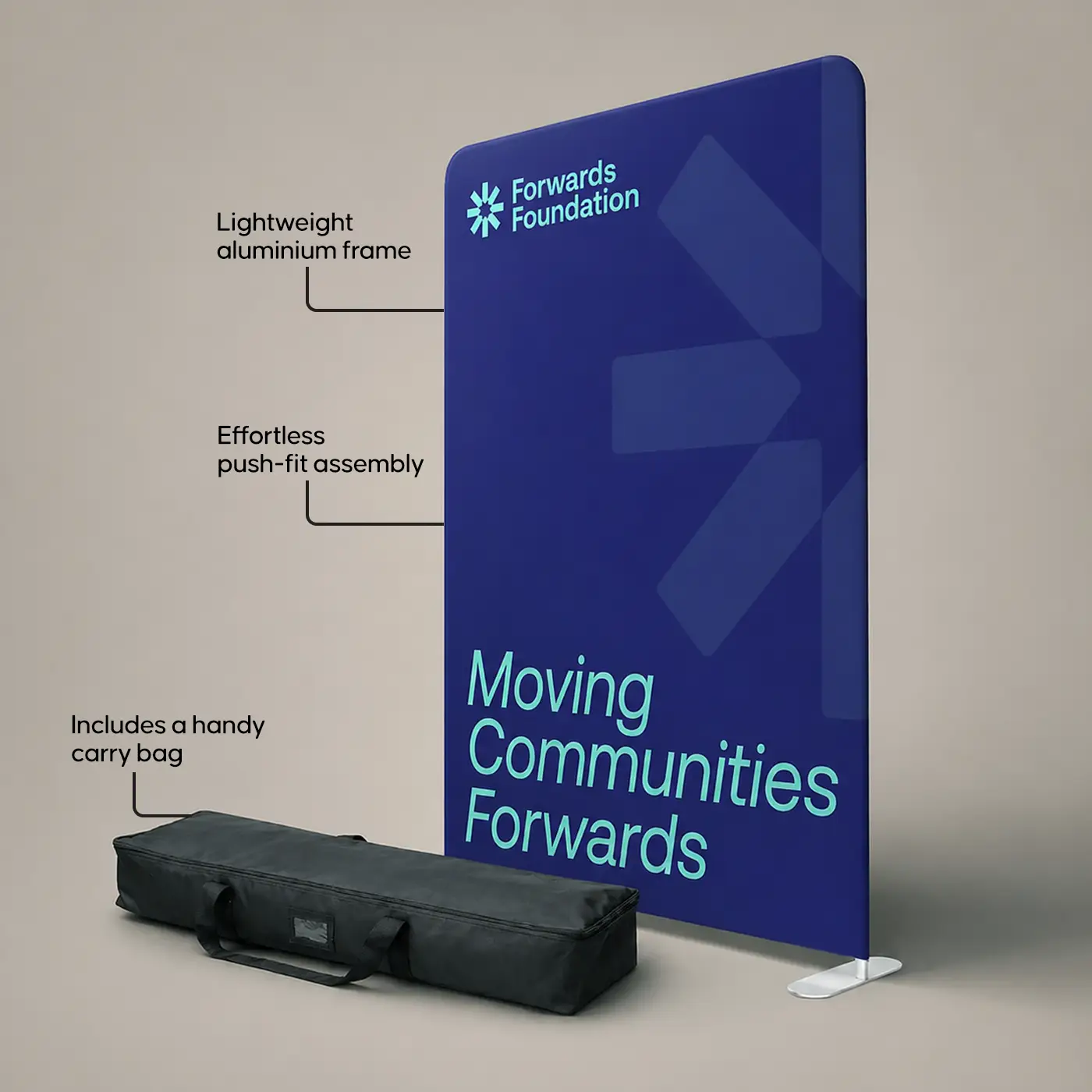 A stretch fabric display stand with a dark blue printed graphic and a black carry bag placed in front of it