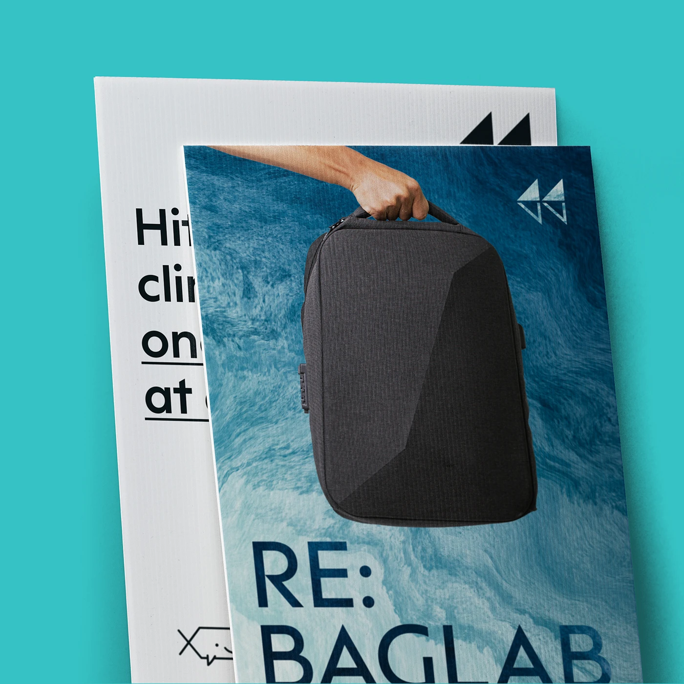 Two branded Correx Signs showing a black geometric backpack against a blue water pattern, displayed on a teal background.