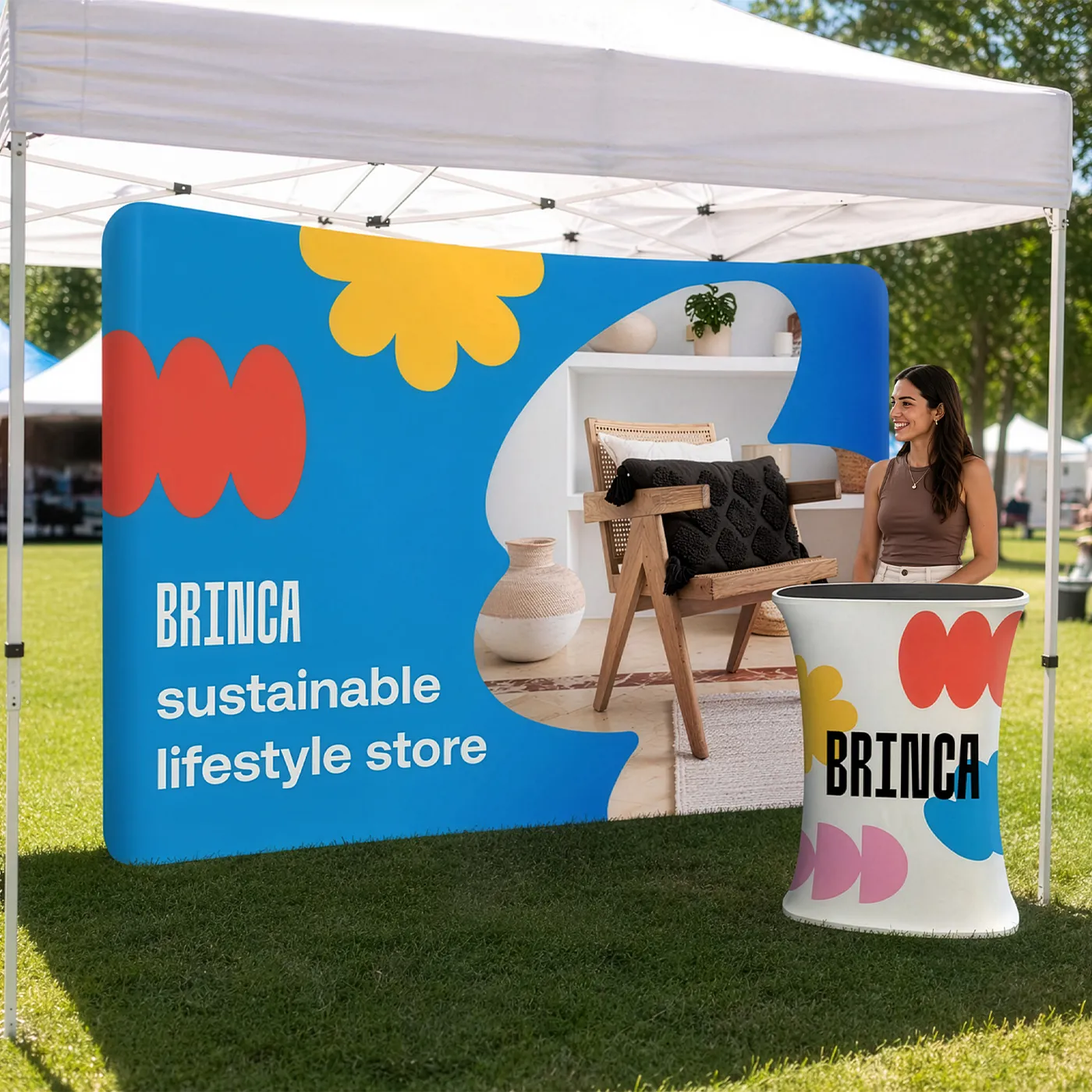 Curved Pop Up Banner and a matching Counter for "Brinca Sustainable Lifestyle Store" at an event.
