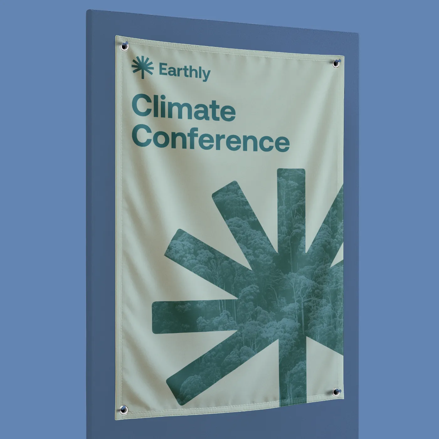 A Custom Flag on a board for the Earthly Climate Conference featuring a large teal graphic and logo on a light background
