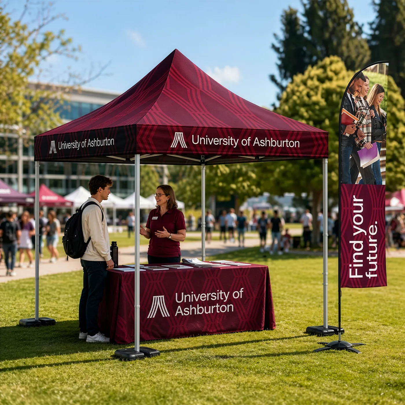 A Standard Gazebo stand for the University of Ashburton, featuring a maroon pattern and the slogan "Find your future" on a nearby Feather Flag.