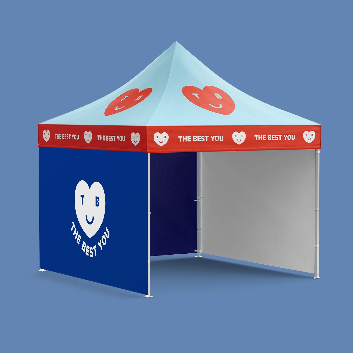 A light blue and red Deluxe Gazebo with single-sided print for "The Best You" featuring heart illustrations, a red valance, and full-height dark blue side walls, set against a blue background.