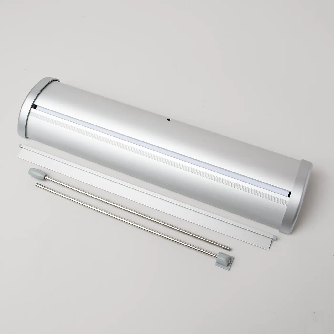 Desktop Roller Banner hardware image, including the silver metal base cassette, top rail, and a two-part support pole.
