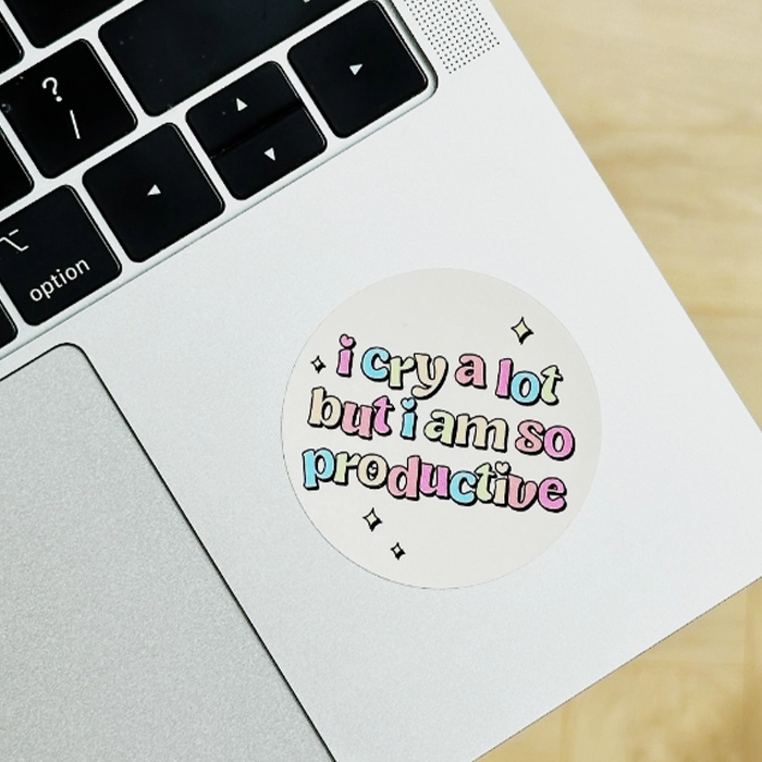 Round Die Cut Stickers on a laptop