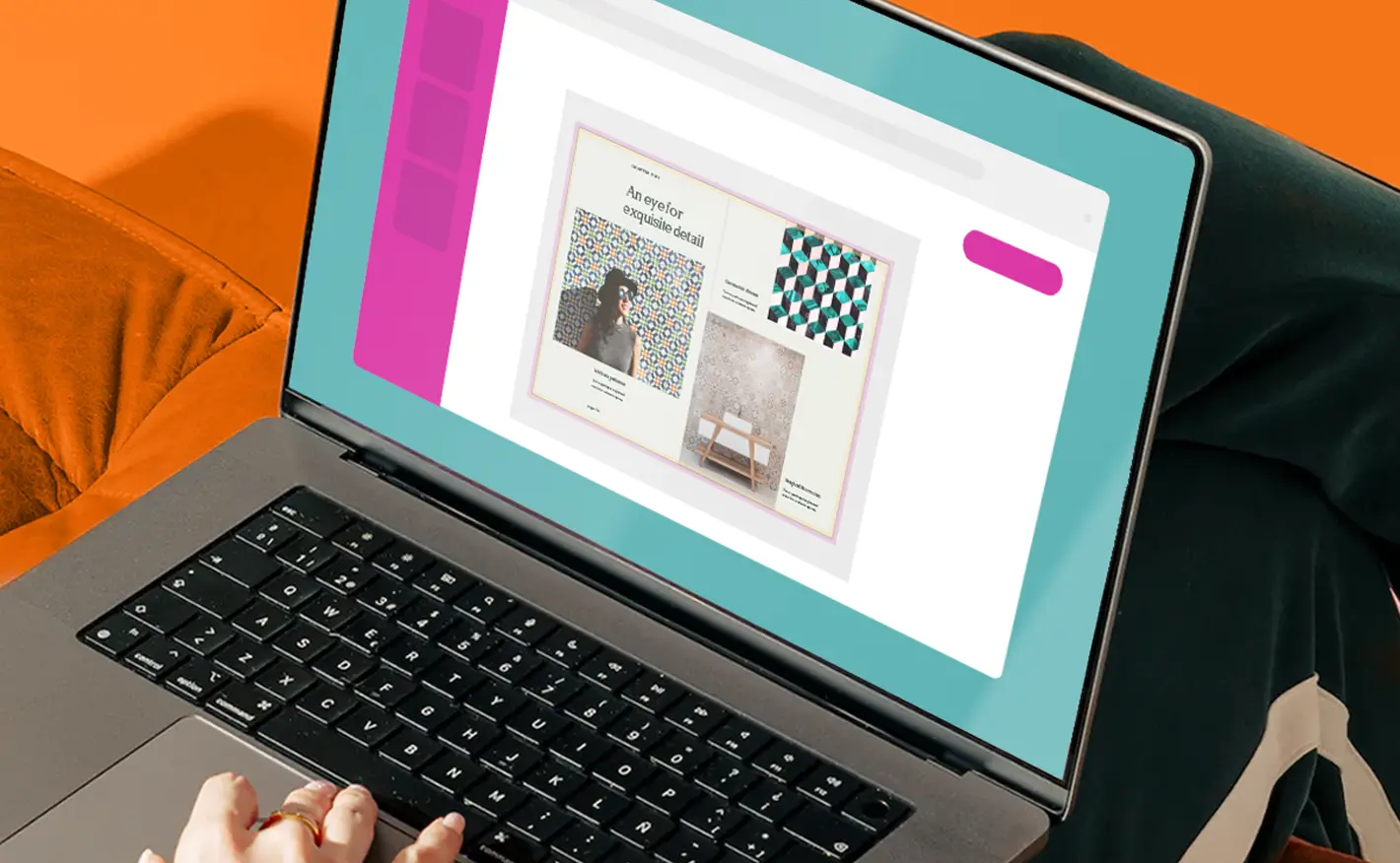 A laptop resting on someone's lap displaying an open digital design editor with a layout spread featuring images and text.