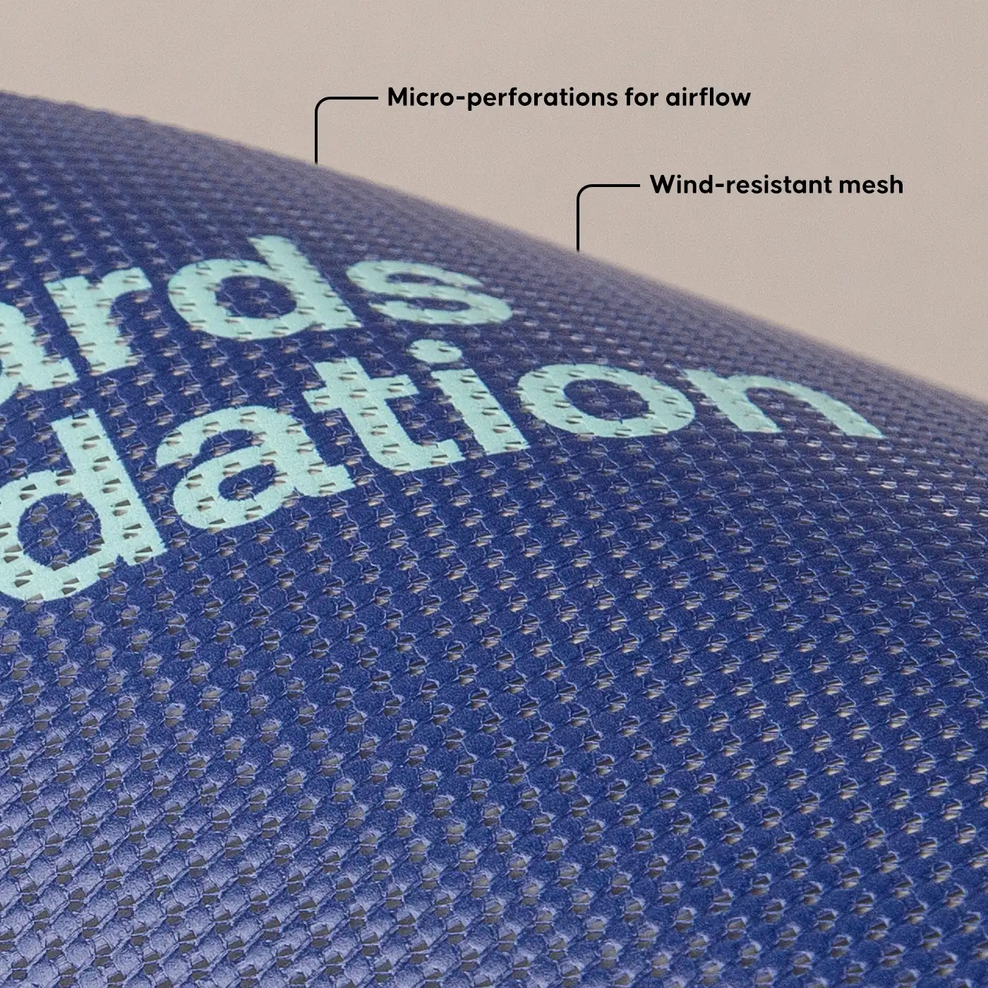 Close-up of a Mesh Banner featuring micro-perforations for airflow and wind-resistant material.