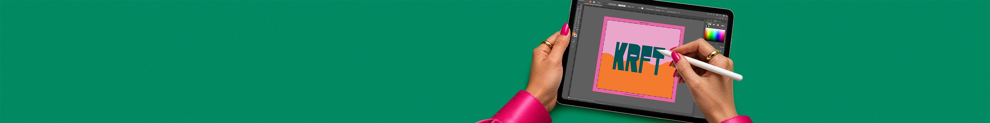 A person holding a graphics tablet and using a stylus to design a square pink and orange "KRFT" logo on a digital editing screen, set against a green background.