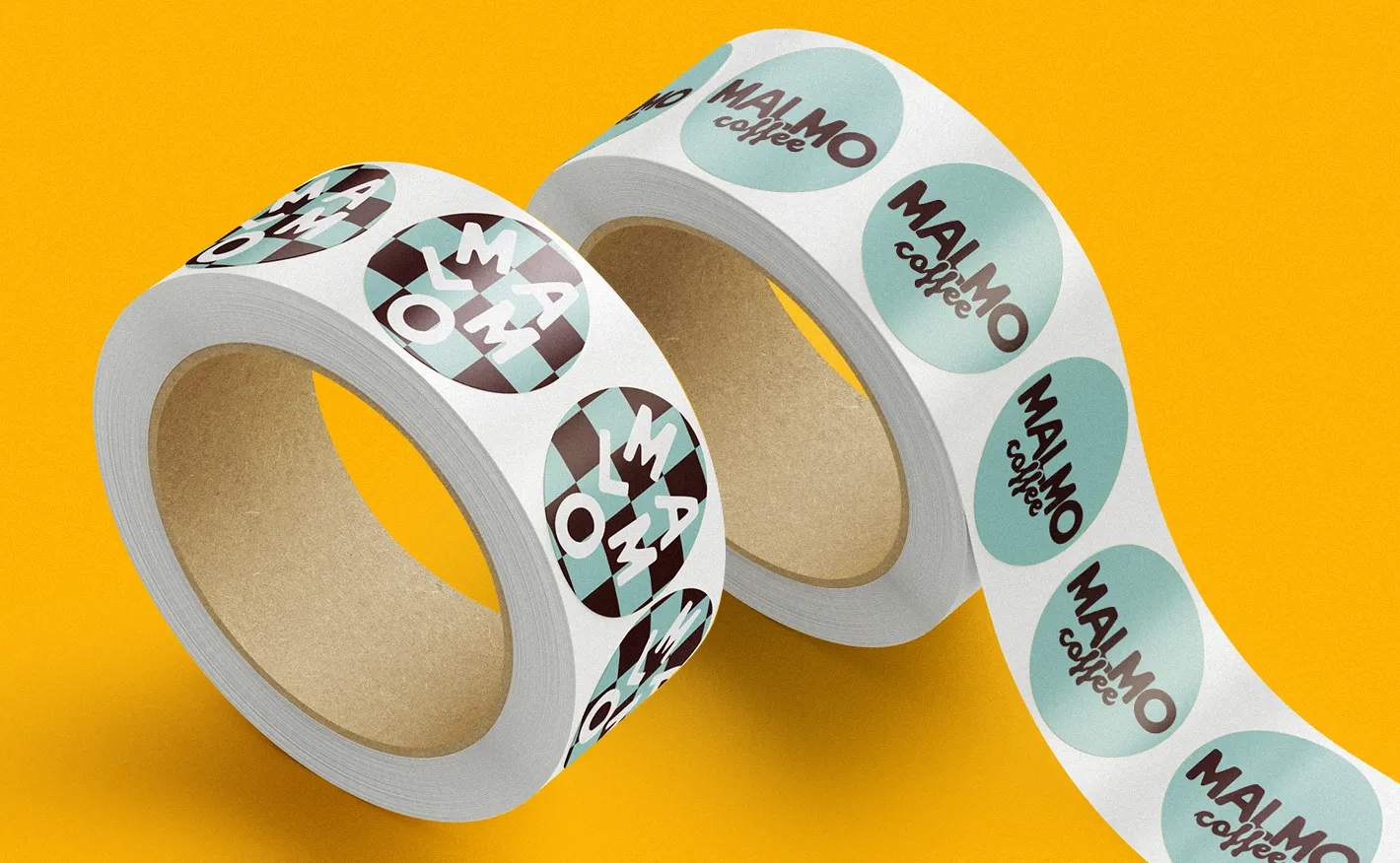 Two rolls of custom printed circular labels against a bright yellow background, one featuring a teal check pattern and the other with a light blue "MALMO coffee" logo.