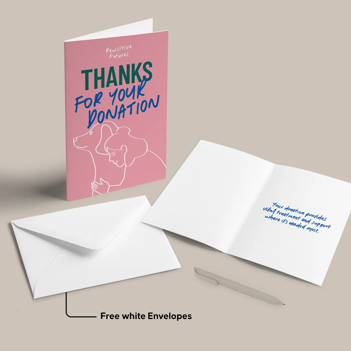 Pink charity Greeting Card reading "Thanks for your donation" with line art of a dog, shown alongside an open blank card and free white Envelopes.