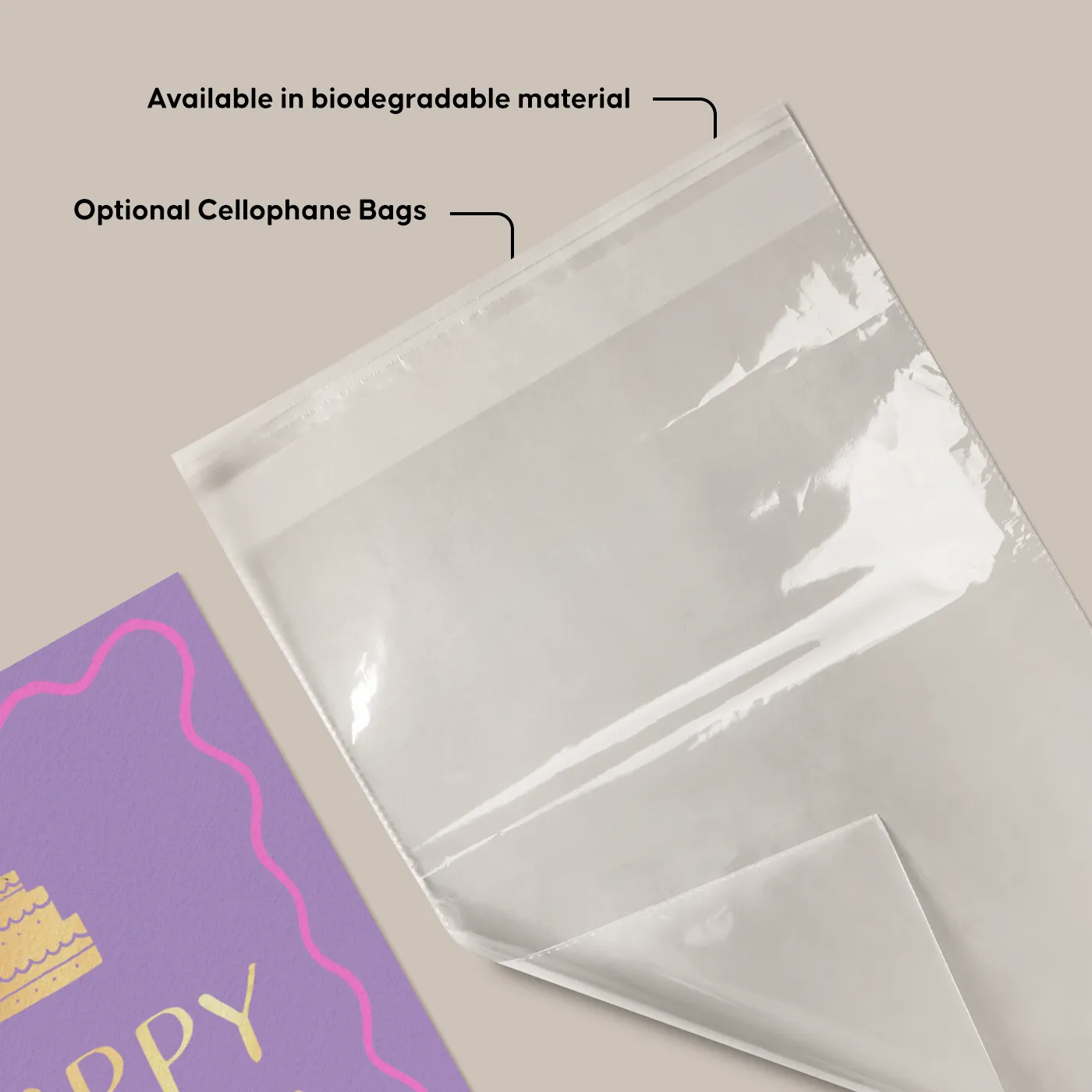 Clear Cellophane Bag for card packaging, shown next to a purple Greeting Card, labeled as optional and available in biodegradable material.