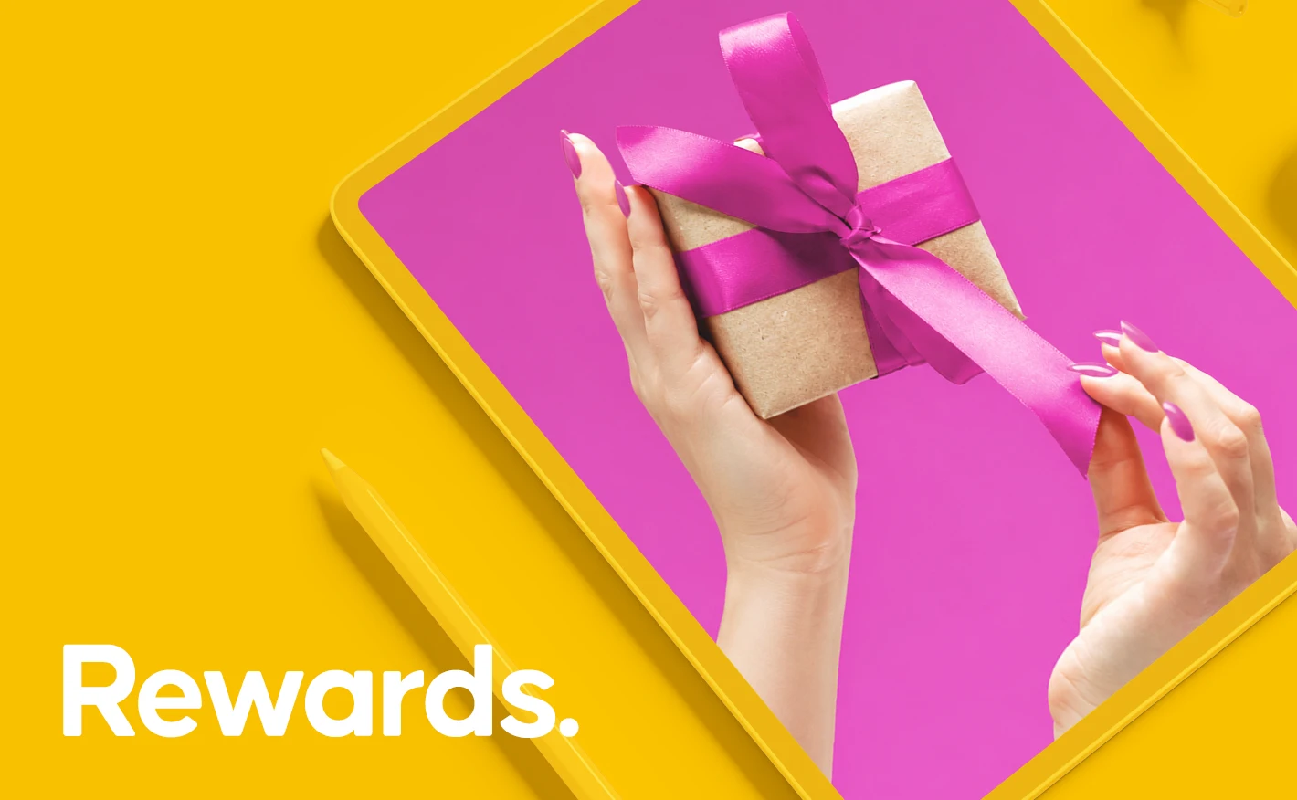 Yellow graphic showing hands untying a pink ribbon on a small brown gift box on a tablet screen, beside the text 'Rewards.'