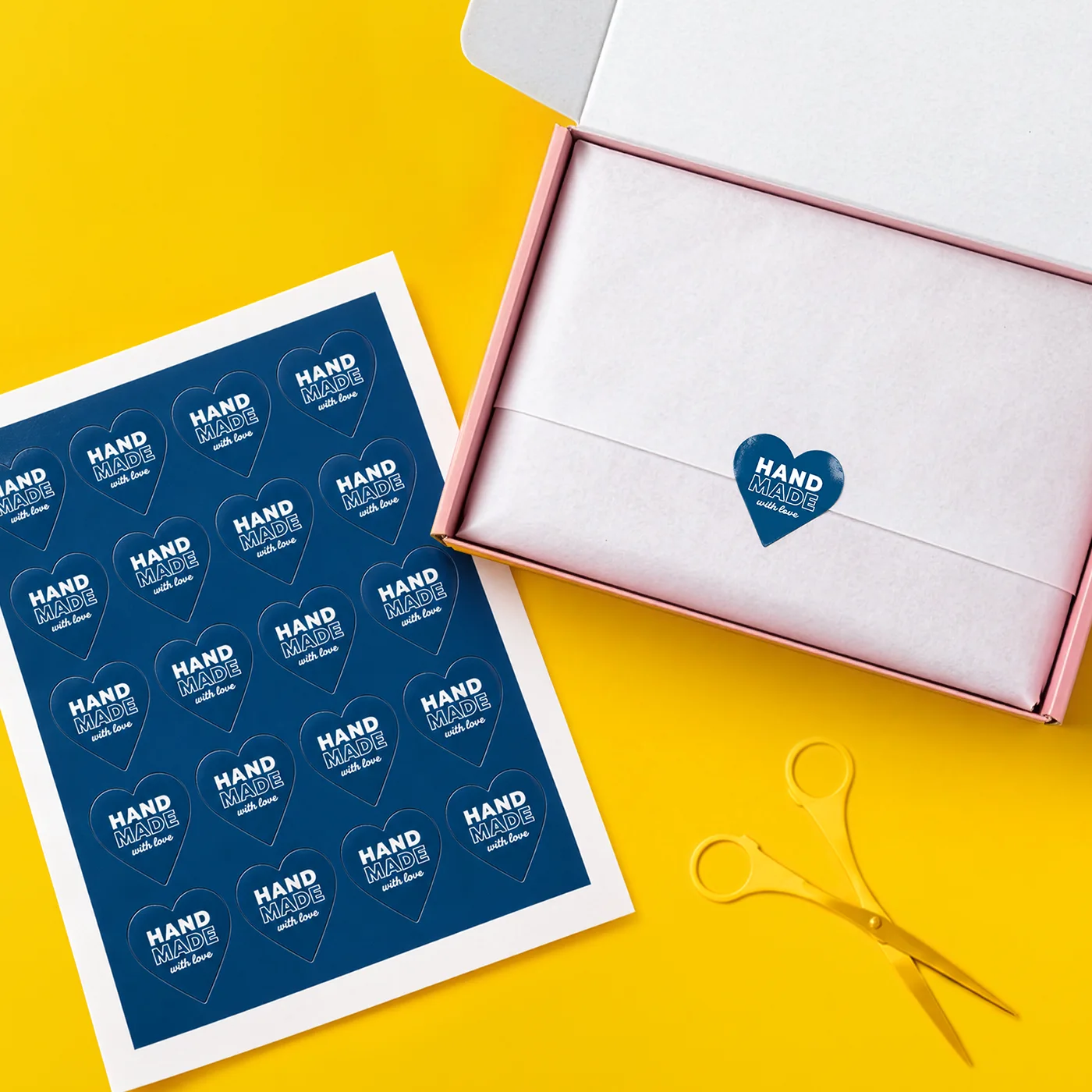 Heart Shaped Sticker Sheet shown sealing a gift box packaging order.