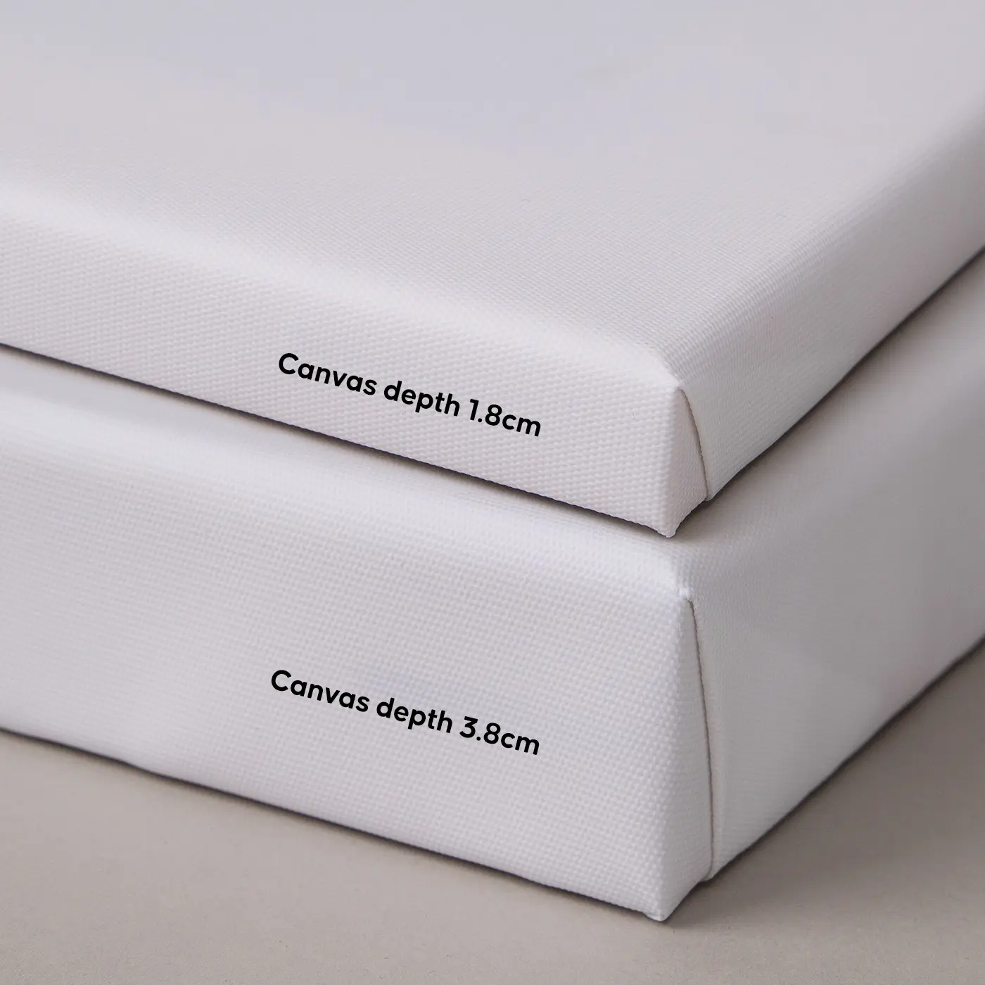 Two stretched Canvas Prints shown side by side, highlighting 1.8cm and 3.8cm canvas depth options with a clean white finish.