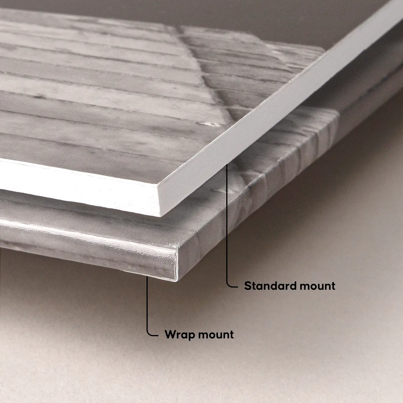 Close-up comparison of standard and wrap-mounted Photo Prints, showing the different edge profiles and mounting depths.